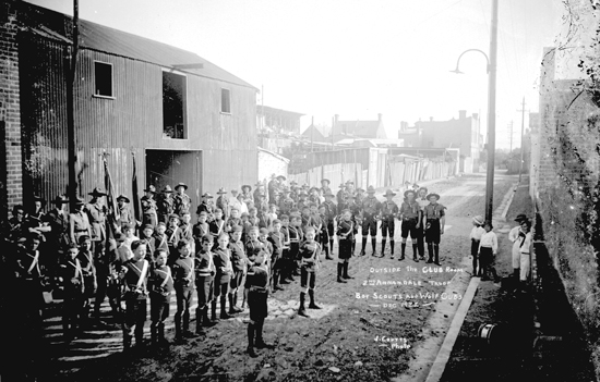 "Outside the Club Room @nd Annandale Troop Boy Scouts and Wolf Cubs Dec 192[2] J. Coutts Photo"